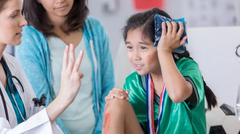 The Definitive Guide to Pediatric Head Concussions in Youth Outdoor Sports